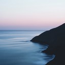 calm reflections of a tranquil coastal scene