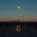 solitary guitar echoes across barren sands