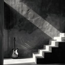 eerie, powerful guitar rips that storm through shadows.