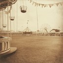 instrumental piece reminiscing old carnival days, soft and nostalgic.