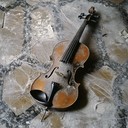 haunting violin pierces silence like ghostly whispers